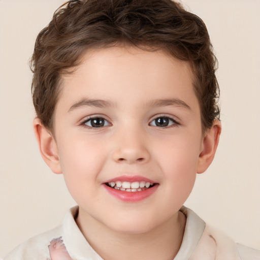 Joyful white child male with short  brown hair and brown eyes