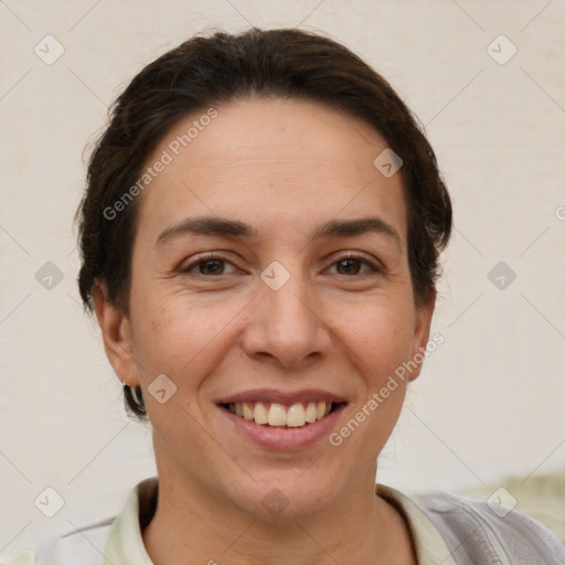 Joyful white adult female with short  brown hair and brown eyes