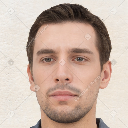 Neutral white young-adult male with short  brown hair and brown eyes