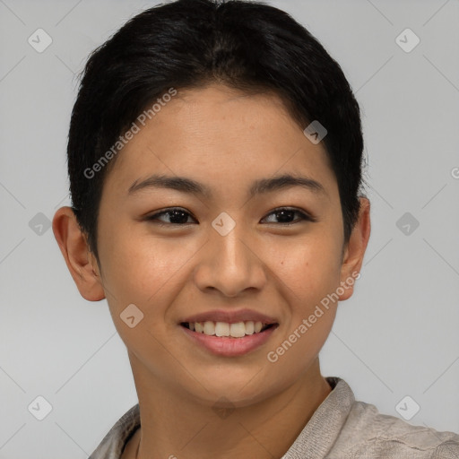 Joyful asian young-adult female with short  brown hair and brown eyes