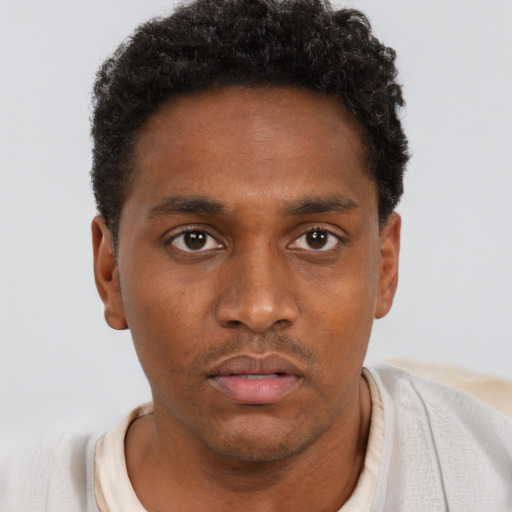 Neutral black young-adult male with short  brown hair and brown eyes