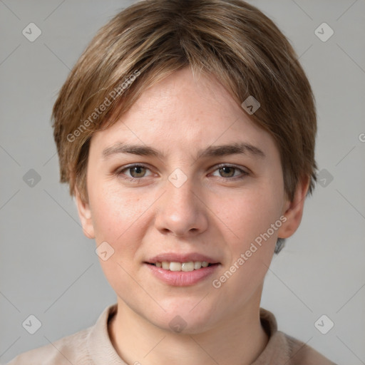 Joyful white young-adult female with short  brown hair and grey eyes