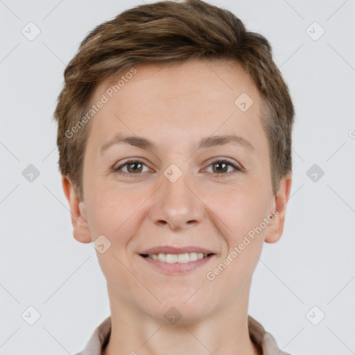 Joyful white young-adult female with short  brown hair and brown eyes