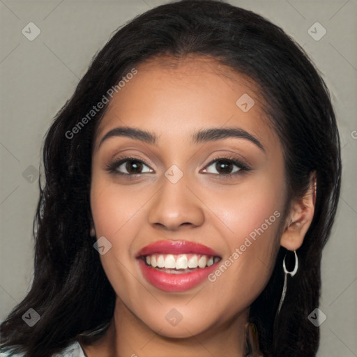 Joyful latino young-adult female with long  black hair and brown eyes