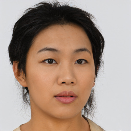 Neutral asian young-adult female with medium  brown hair and brown eyes