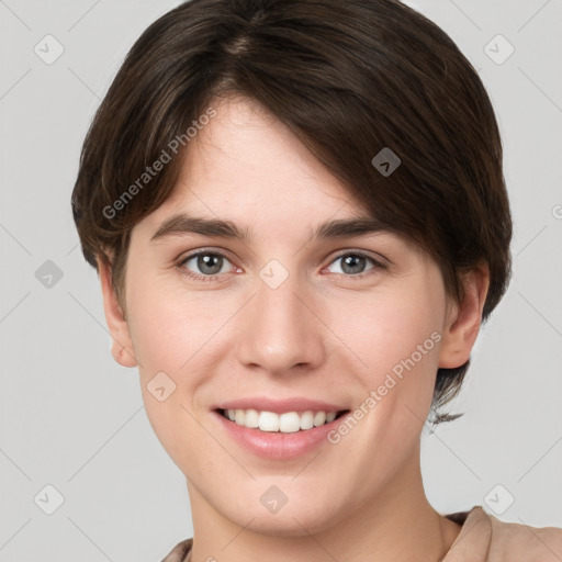 Joyful white young-adult female with medium  brown hair and grey eyes