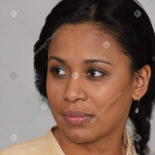 Joyful latino young-adult female with medium  brown hair and brown eyes