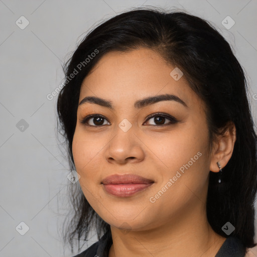 Joyful asian young-adult female with medium  black hair and brown eyes