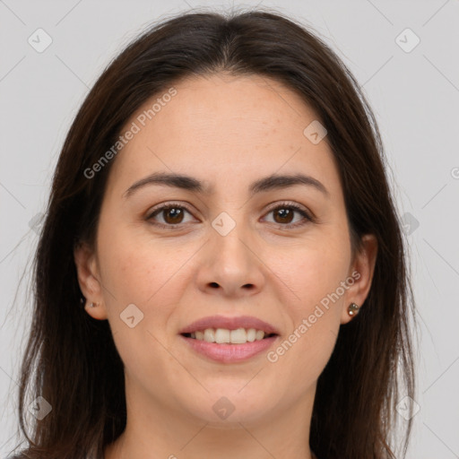 Joyful white young-adult female with long  brown hair and brown eyes