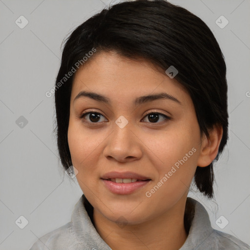 Joyful asian young-adult female with medium  black hair and brown eyes