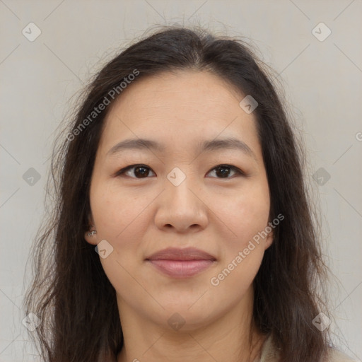 Joyful asian young-adult female with long  brown hair and brown eyes