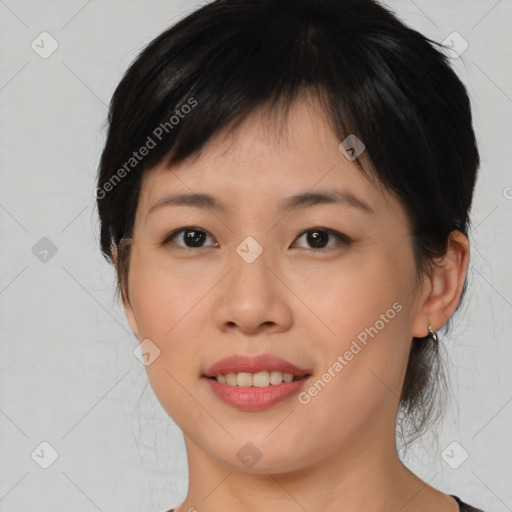 Joyful asian young-adult female with medium  brown hair and brown eyes