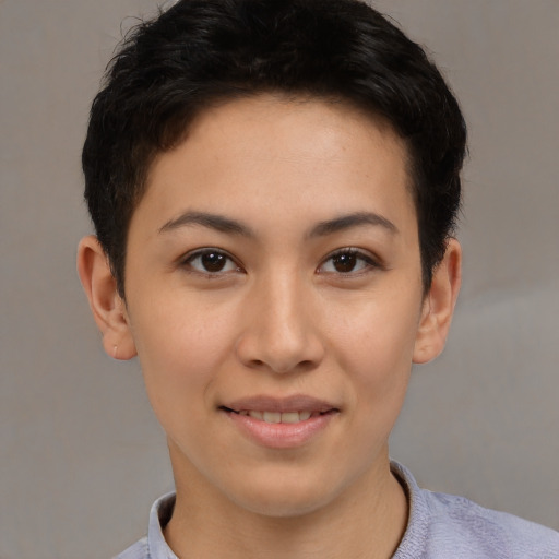 Joyful white young-adult female with short  black hair and brown eyes