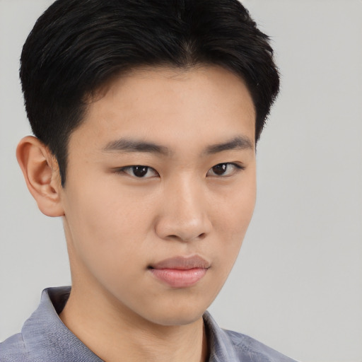 Neutral asian young-adult male with short  brown hair and brown eyes