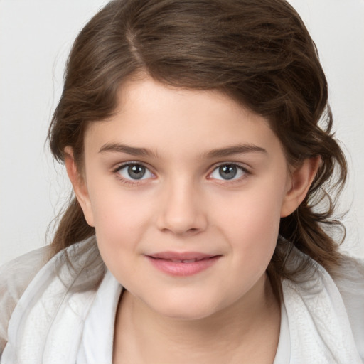 Joyful white child female with medium  brown hair and brown eyes