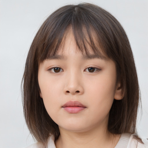 Neutral asian child female with medium  brown hair and brown eyes
