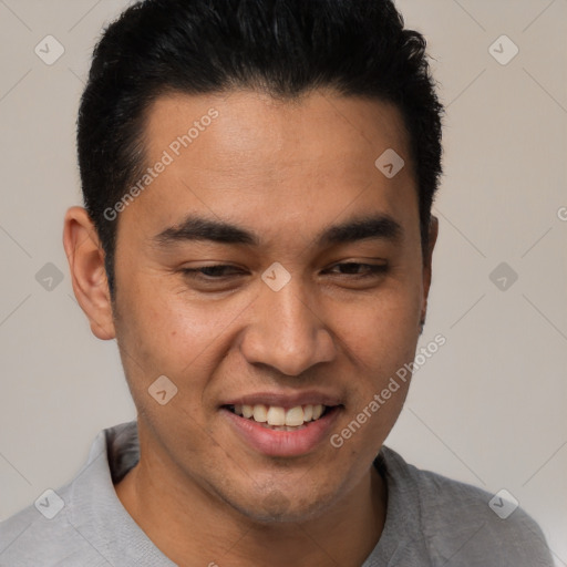 Joyful asian young-adult male with short  brown hair and brown eyes