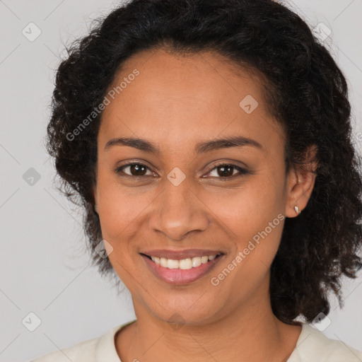 Joyful latino young-adult female with long  brown hair and brown eyes