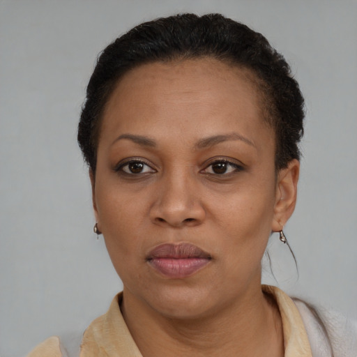 Neutral black adult female with short  brown hair and brown eyes