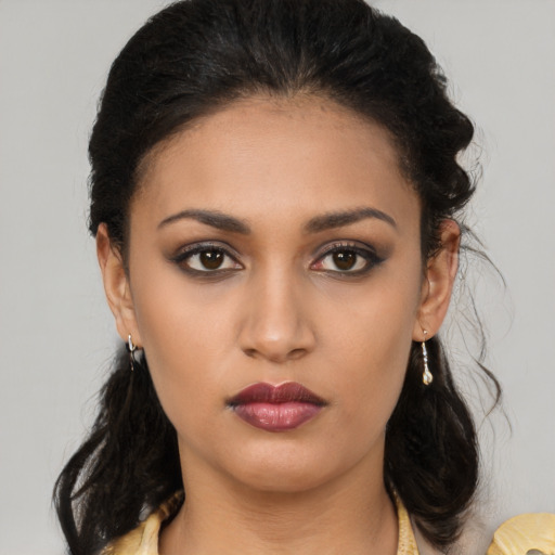 Neutral latino young-adult female with long  brown hair and brown eyes