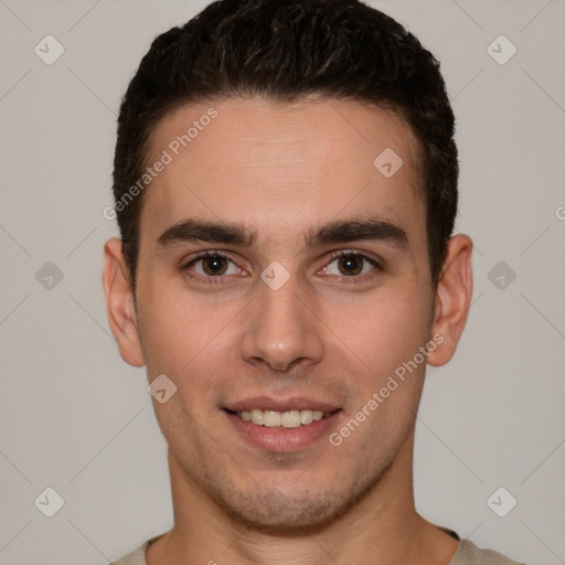 Joyful white young-adult male with short  brown hair and brown eyes