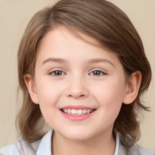 Joyful white child female with medium  brown hair and brown eyes