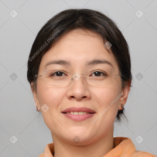 Joyful white adult female with medium  brown hair and brown eyes