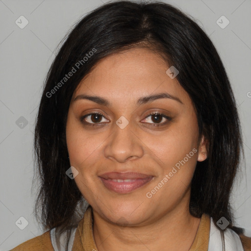 Joyful black young-adult female with medium  brown hair and brown eyes