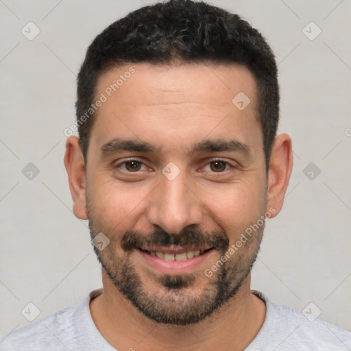 Joyful white young-adult male with short  black hair and brown eyes