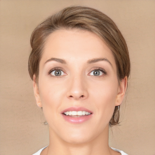 Joyful white young-adult female with medium  brown hair and grey eyes