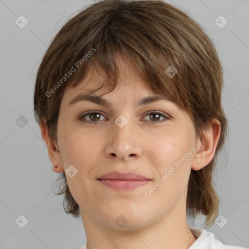 Joyful white young-adult female with medium  brown hair and brown eyes