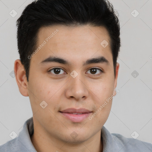 Joyful latino young-adult male with short  brown hair and brown eyes