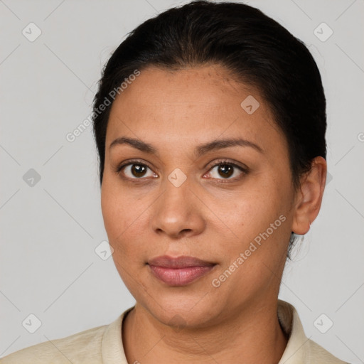 Joyful latino young-adult female with short  brown hair and brown eyes