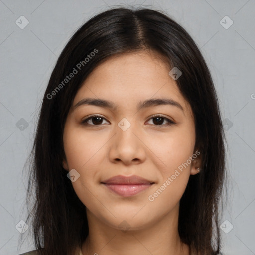 Joyful latino young-adult female with long  brown hair and brown eyes