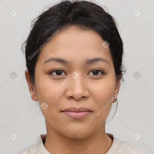 Joyful latino young-adult female with short  brown hair and brown eyes