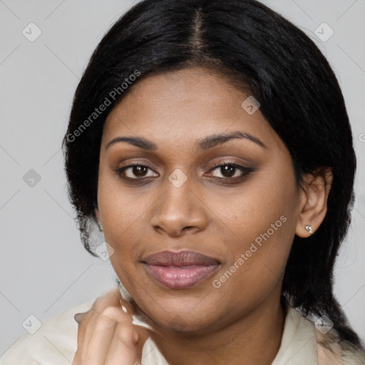 Joyful latino young-adult female with medium  black hair and brown eyes