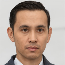 Neutral asian young-adult male with short  black hair and brown eyes