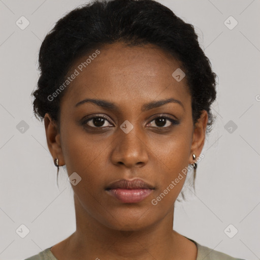 Neutral black young-adult female with short  brown hair and brown eyes