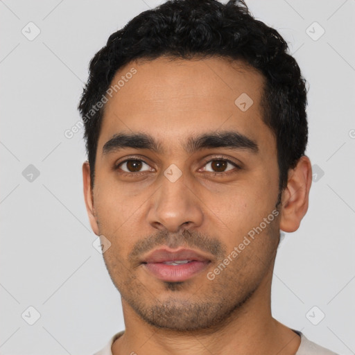 Neutral latino young-adult male with short  black hair and brown eyes