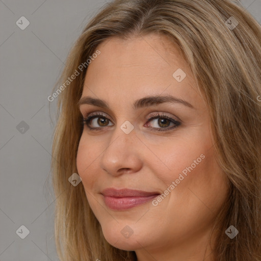 Joyful white young-adult female with long  brown hair and brown eyes