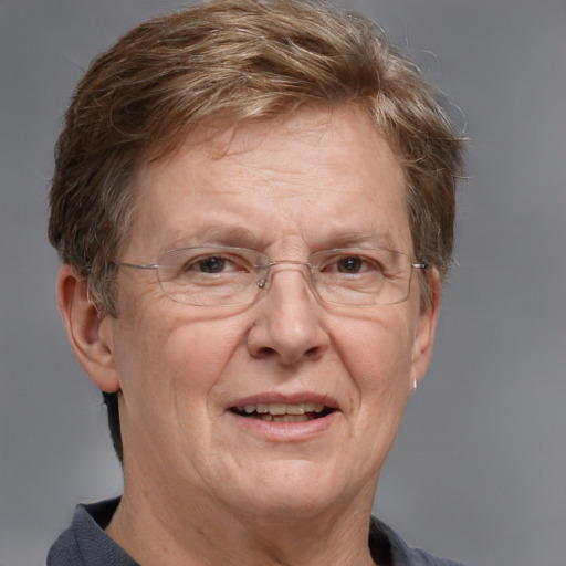 Joyful white middle-aged female with short  brown hair and grey eyes