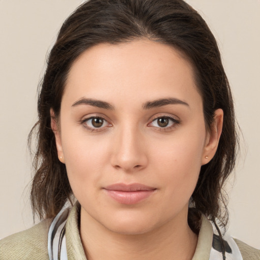 Neutral white young-adult female with medium  brown hair and brown eyes