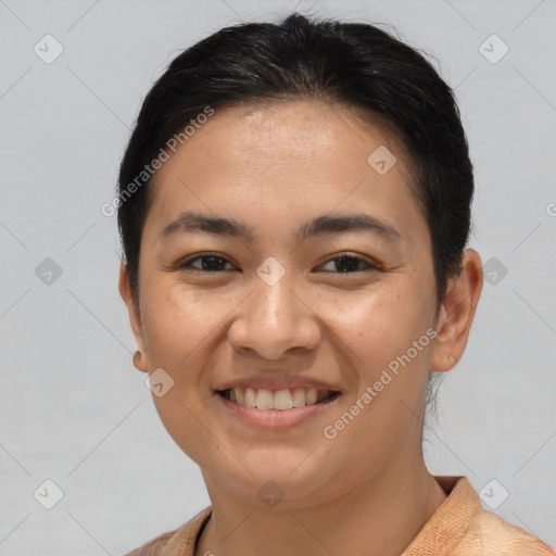 Joyful white young-adult female with short  brown hair and brown eyes