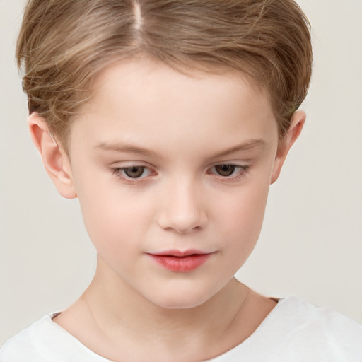 Joyful white child female with short  brown hair and brown eyes