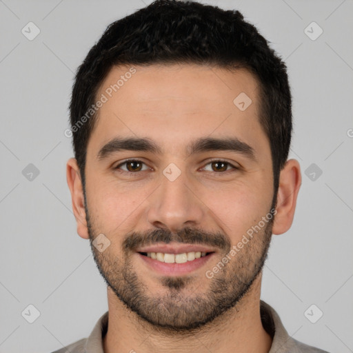 Joyful white young-adult male with short  black hair and brown eyes