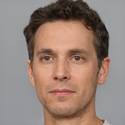 Neutral white adult male with short  brown hair and brown eyes