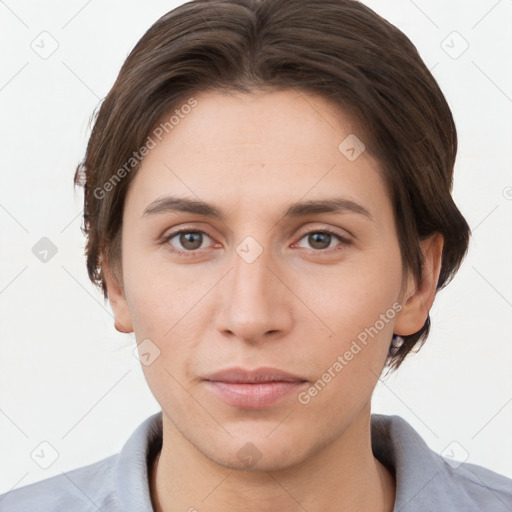 Neutral white young-adult female with short  brown hair and brown eyes