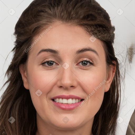 Joyful white young-adult female with long  brown hair and grey eyes