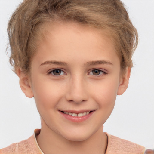 Joyful white child female with short  brown hair and brown eyes