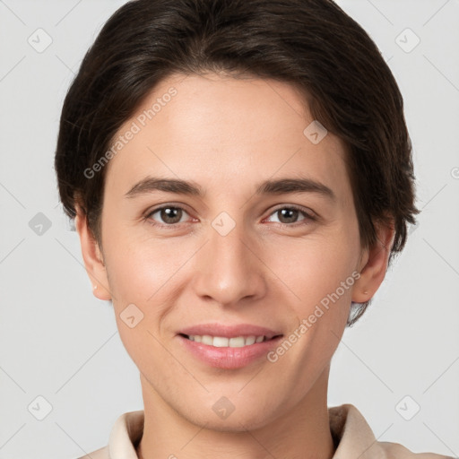 Joyful white young-adult female with short  brown hair and brown eyes